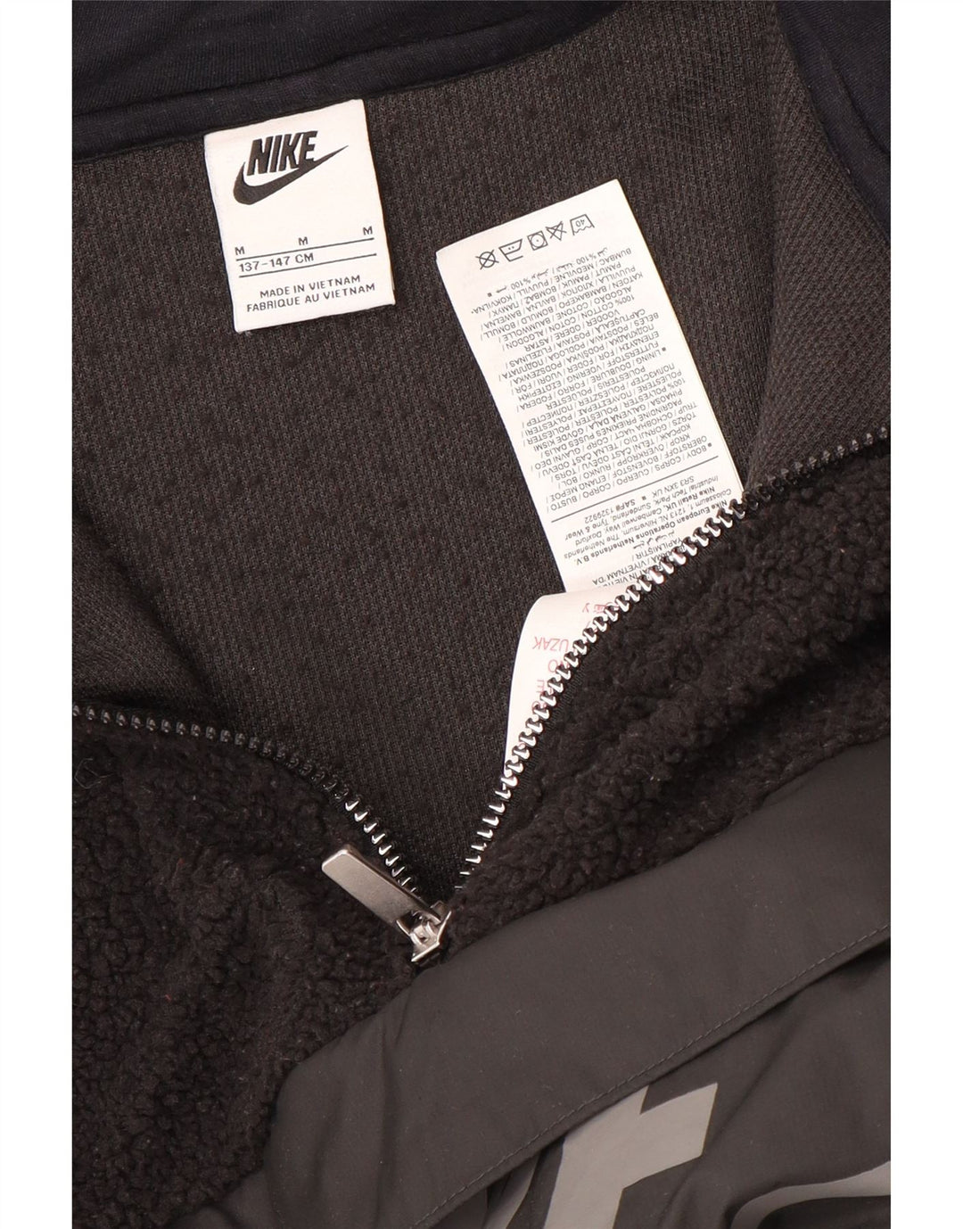 Chłopięcy sweter polarowy Nike z graficznym zamkiem i zamkiem, 10-11 lat, średni czarny poliester