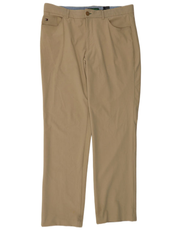 Męskie spodnie chino golfowe Tommy Hilfiger W36 L34 beżowy nylon