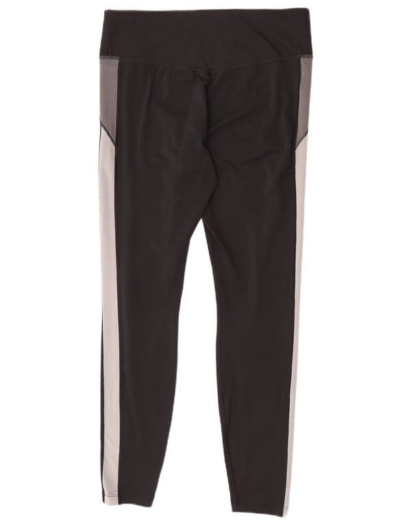 Damskie legginsy Nike Dri Fit UK 16, duży czarny poliester z blokami kolorów