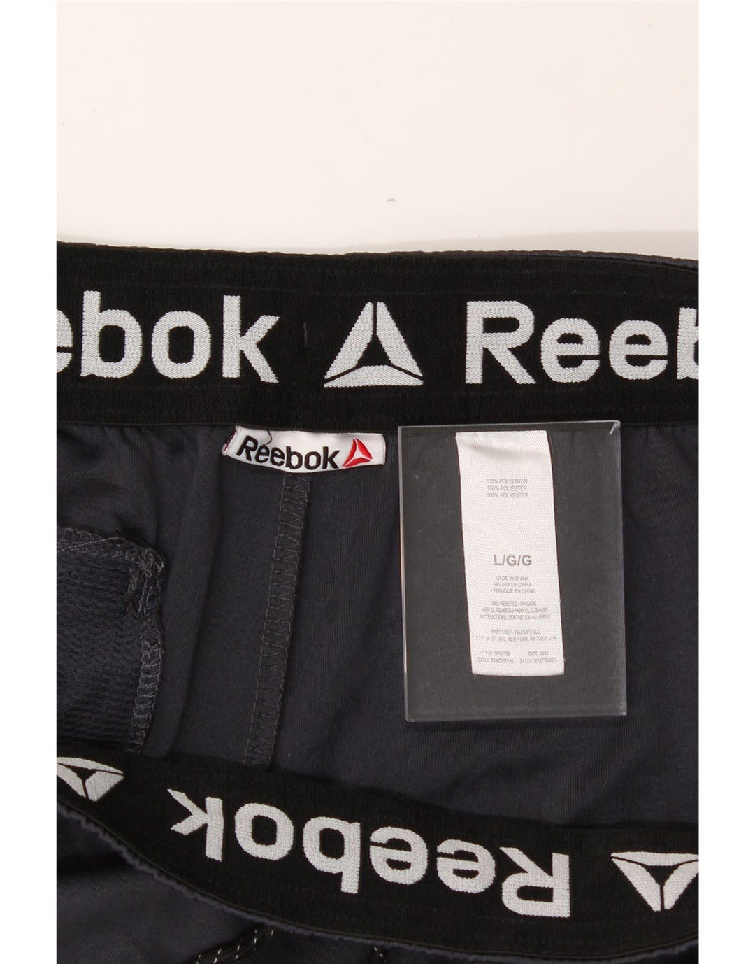 REEBOK Mens Tracksuit Trousers Large  Grey Colourblock Polyester Vintage Reebok and Second-Hand Reebok from Messina Hembry 