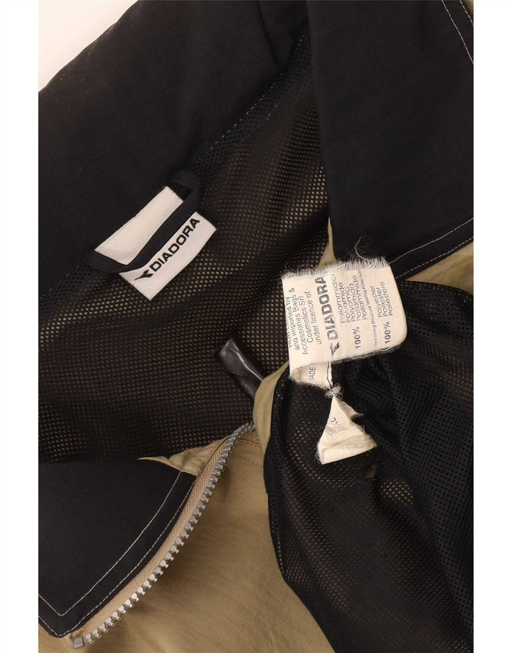 Męska kurtka przeciwdeszczowa Diadora UK 42 XL Beżowy poliamid