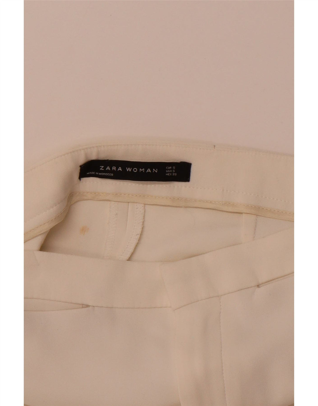 Damskie spodnie typu slim casual ZARA, małe W26 L25, białe