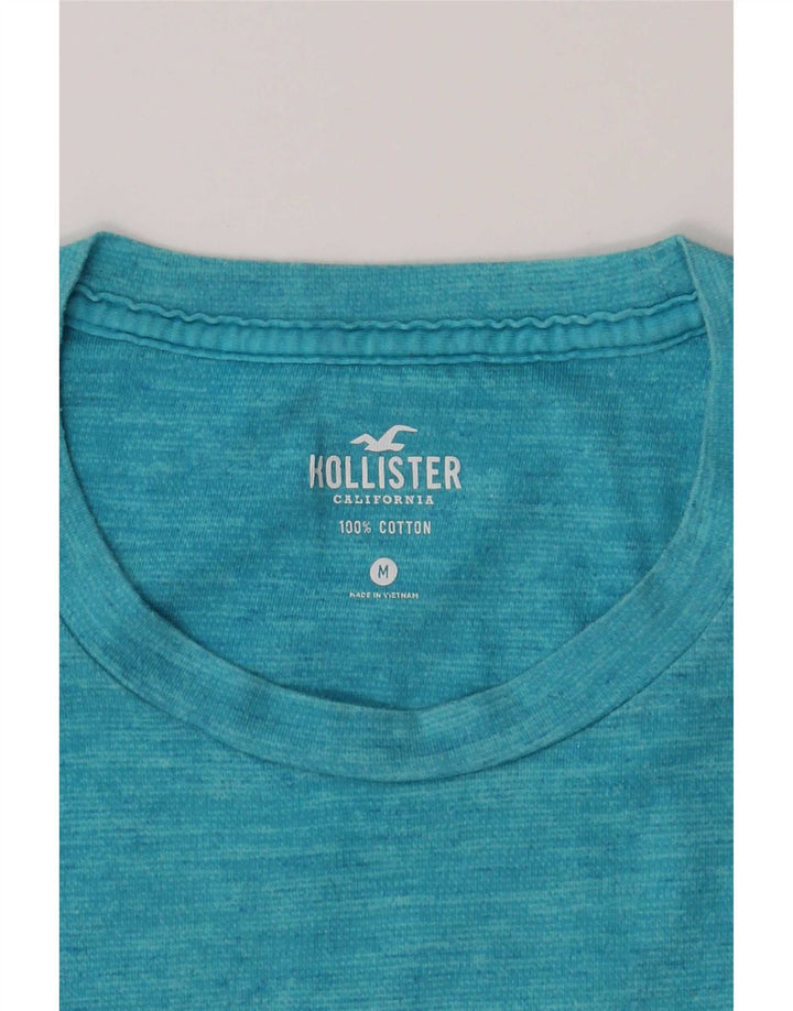 Męska koszulka z grafiką Hollister, bawełniana, w kolorze średniego błękitu