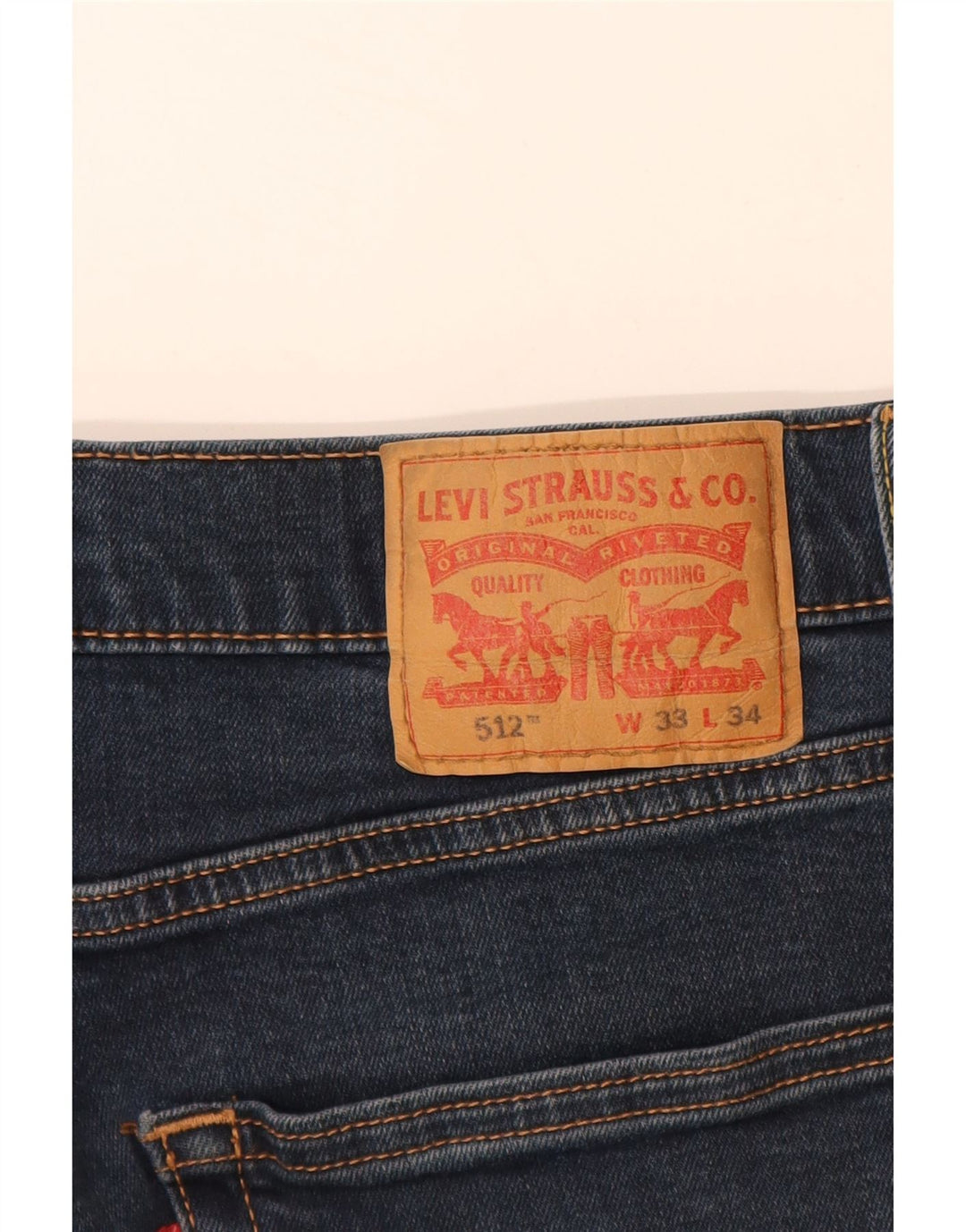 Męskie jeansy LEVI'S 512 Slim Tapered W33 L32 Granatowa bawełna