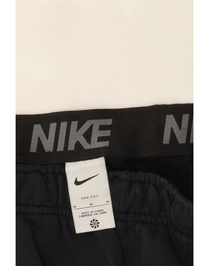 Męskie spodnie dresowe Nike Dri Fit Graphic, średnie czarne