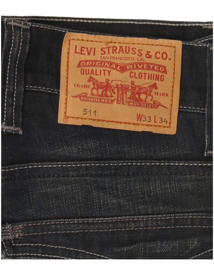 Męskie jeansy LEVI'S 511 Slim W33 L34 Granatowa bawełna