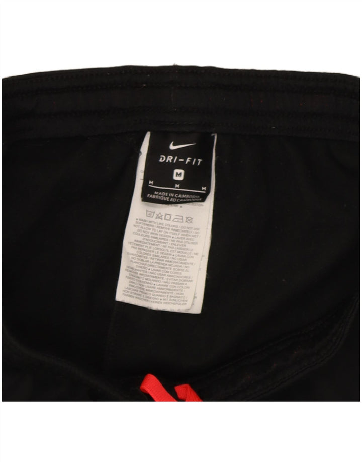 Damskie spodnie dresowe Nike UK 12, poliester w kolorze średniej czarnej kolorystyki