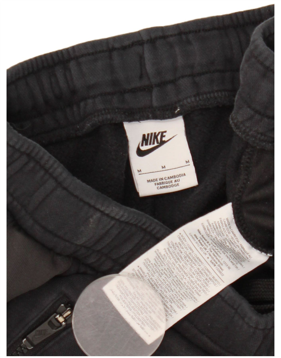 Męskie spodnie dresowe Nike Graphic Joggers, średnia czarna bawełna