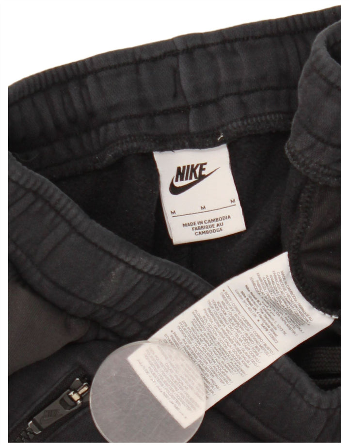 Męskie spodnie dresowe Nike Graphic Joggers, średnia czarna bawełna