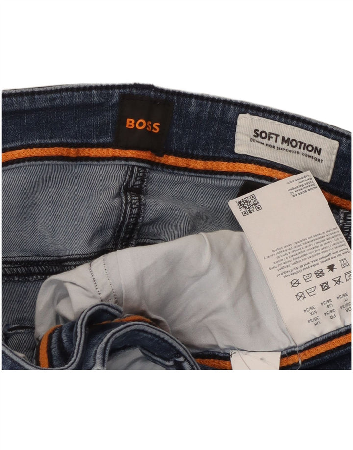 Damskie dżinsy Hugo Boss Soft Motion Slim W36 L34 Niebieska bawełna