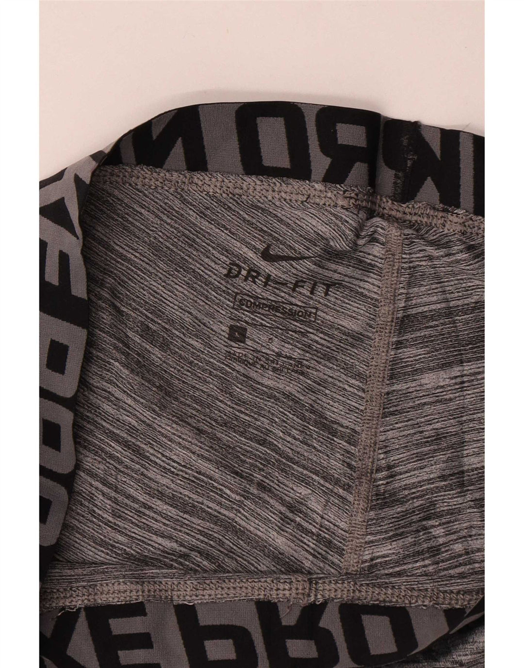 Męskie legginsy Nike Dri Fit Graphic, duże, szare nakrapiane