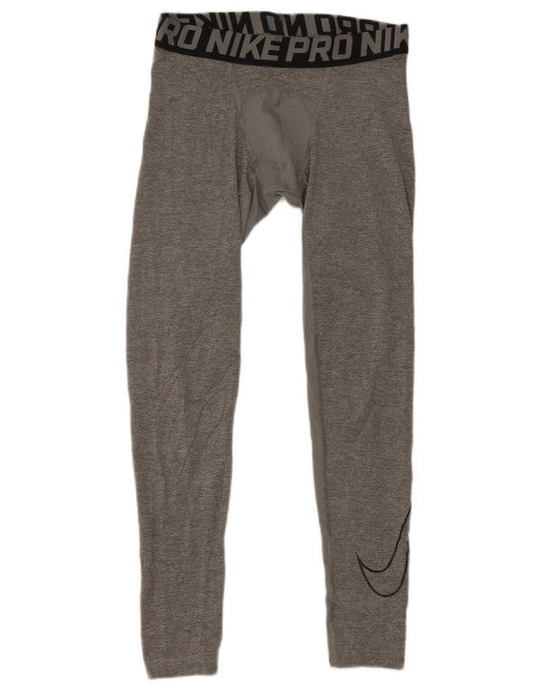 Chłopięce legginsy Nike Dri Fit Graphic 12-13 lat, duże, szare, z blokami kolorów