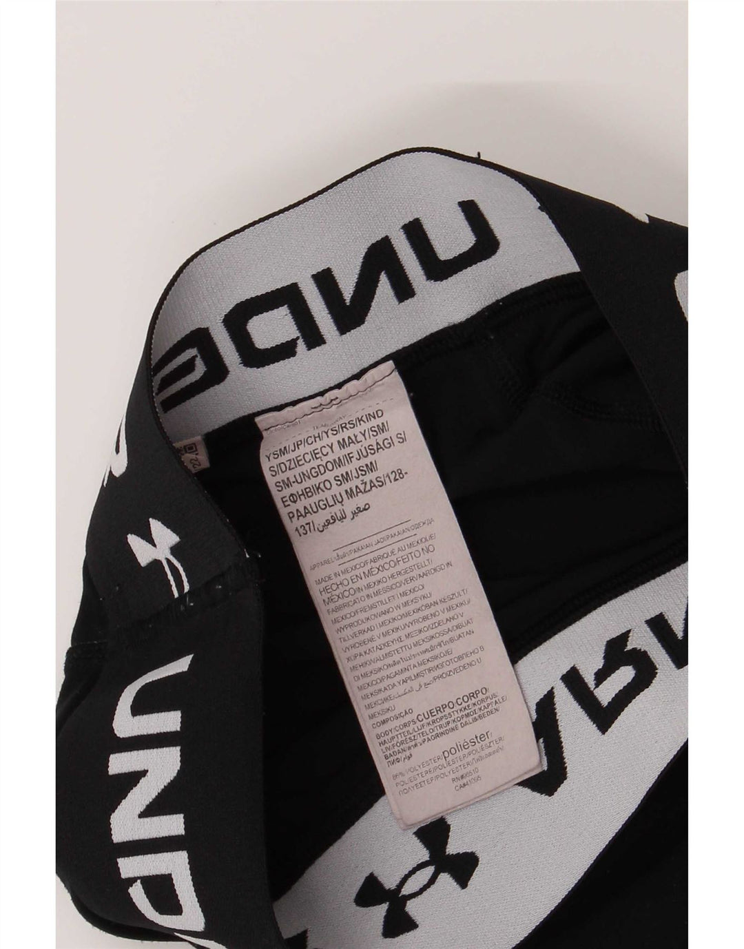 Dziewczęce legginsy Capri z grafiką Under Armour 7-8 lat, małe, czarne, poliestrowe