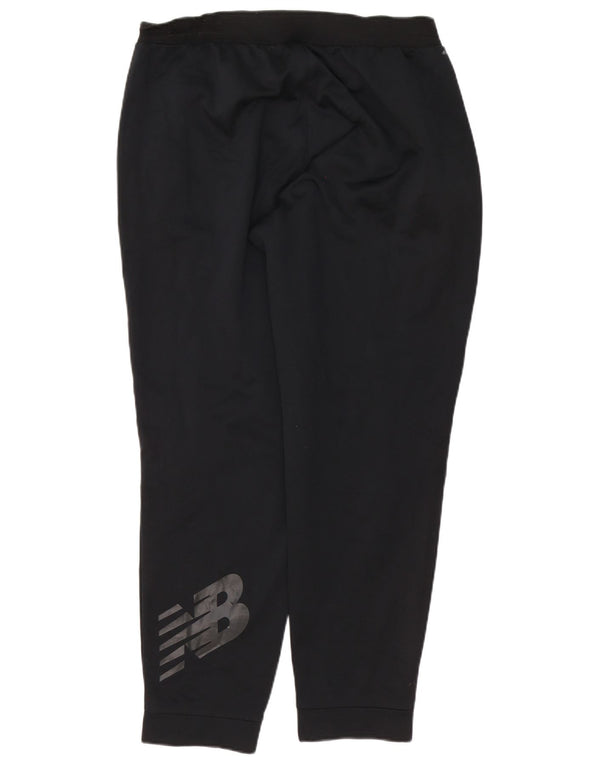Męskie spodnie dresowe New Balance z grafiką XL, czarne