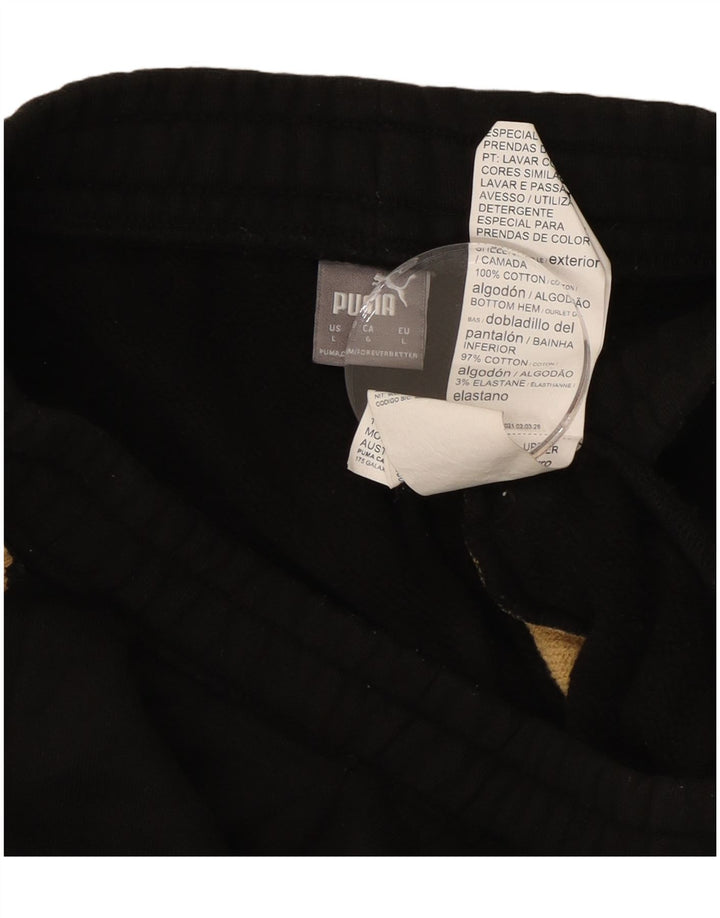 Damskie spodnie dresowe PUMA Joggers UK 14 Duży czarny nadruk zwierzęcy