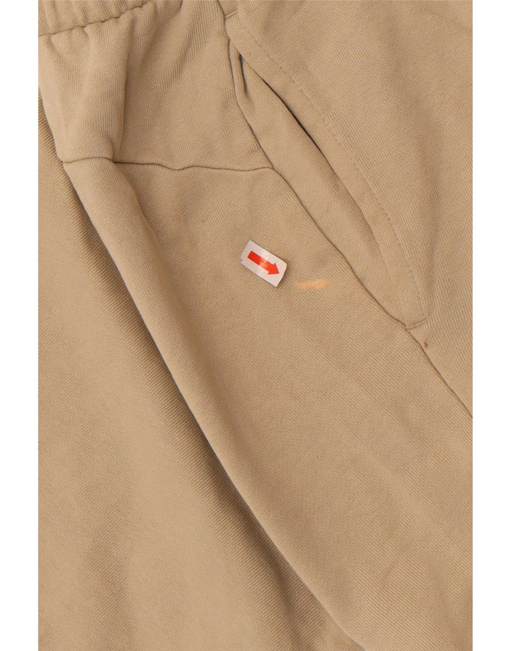 Męskie spodnie dresowe Puma Joggers w kolorze średniego beżu, bawełny