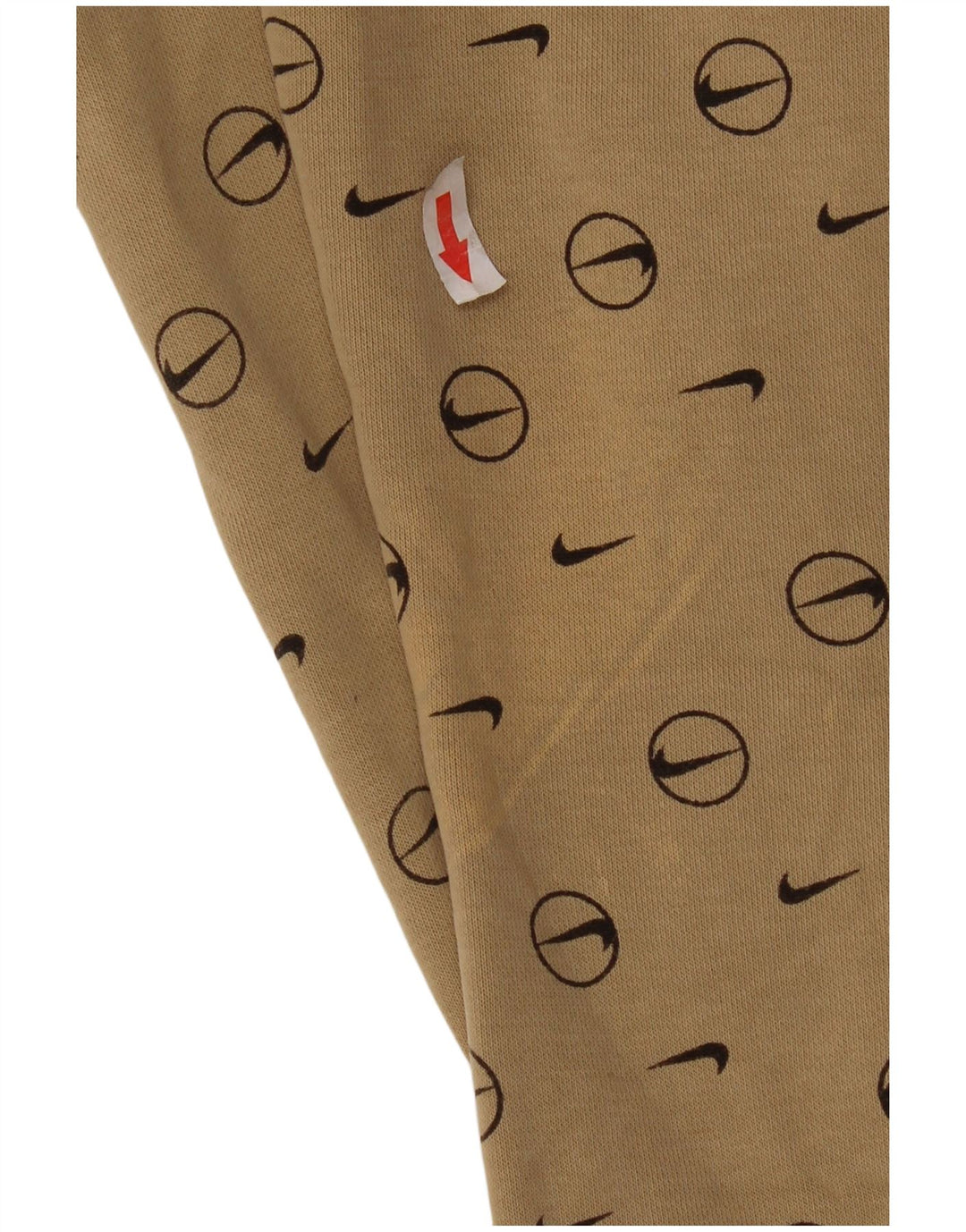 Męskie spodnie dresowe Nike z grafiką, małe, beżowe, geometryczne