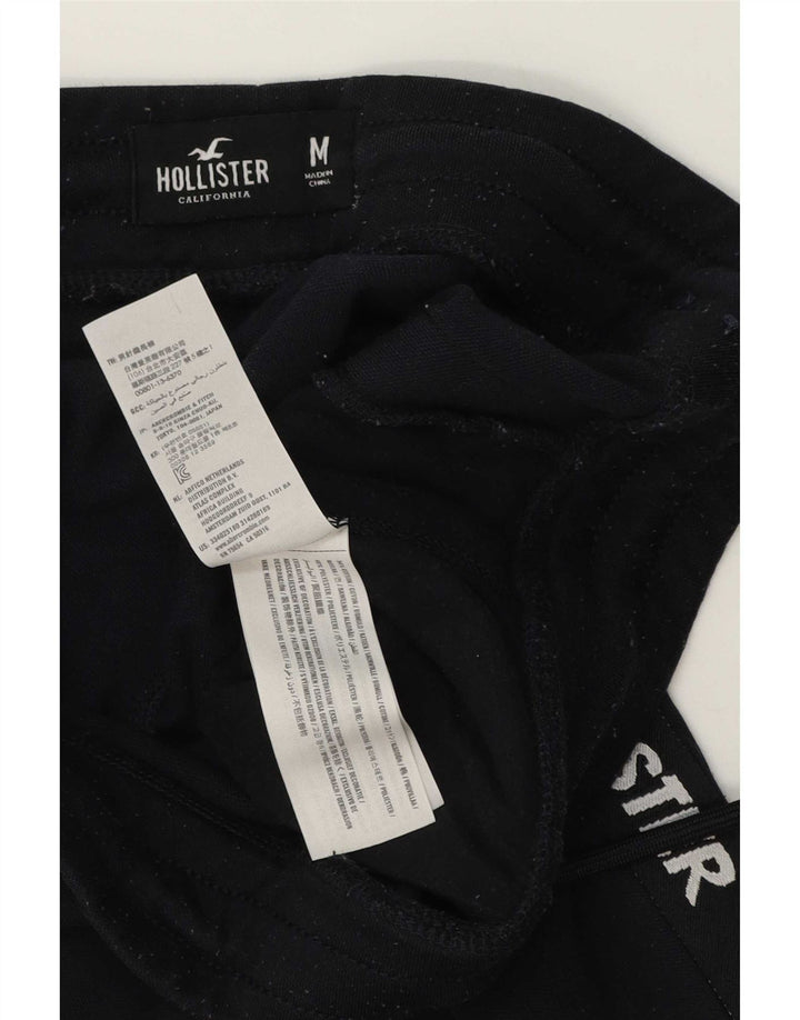 Męskie spodnie dresowe Hollister Graphic, średniej wielkości, granatowe, bawełniane