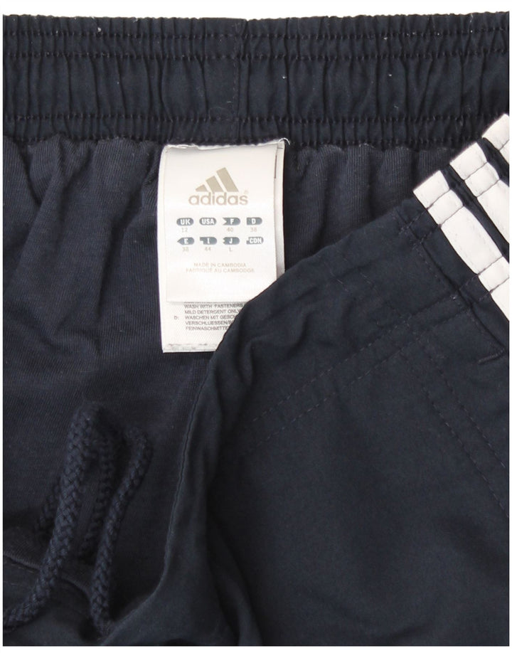 Damskie spodnie dresowe Adidas UK 12 Średni granatowy poliester