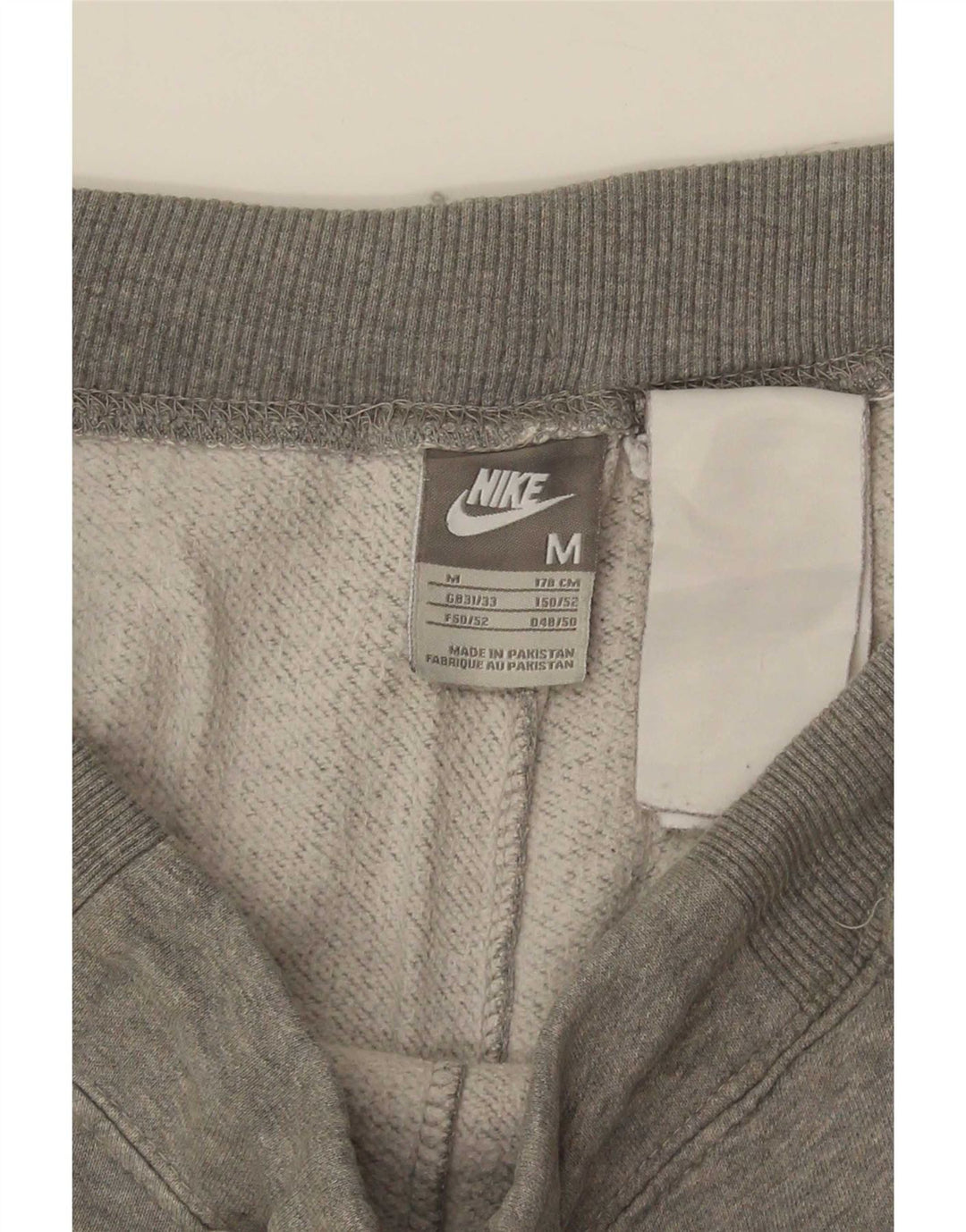 Męskie spodnie dresowe Nike, średnioszare, nakrapiane