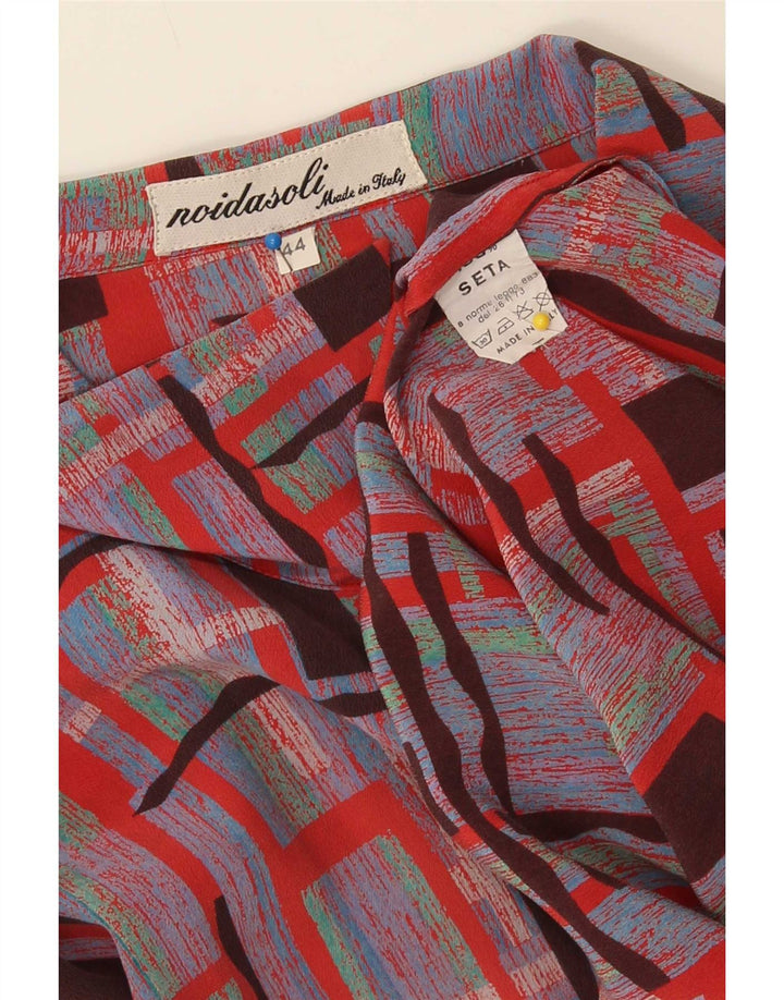 Damska bluzka koszulowa oversize w stylu vintage IT 44 Średnia, wielokolorowa, geometryczna
