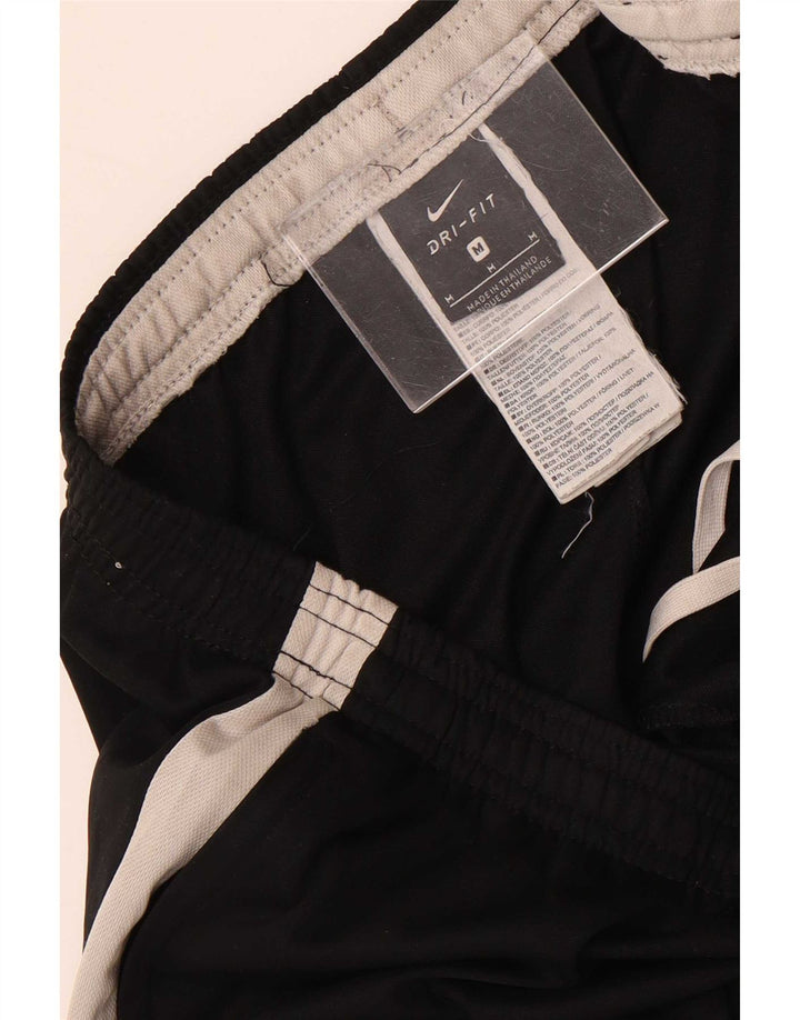 Męskie spodnie dresowe Nike Dri Fit, poliester w kolorze średniej czarnej kolorystyki