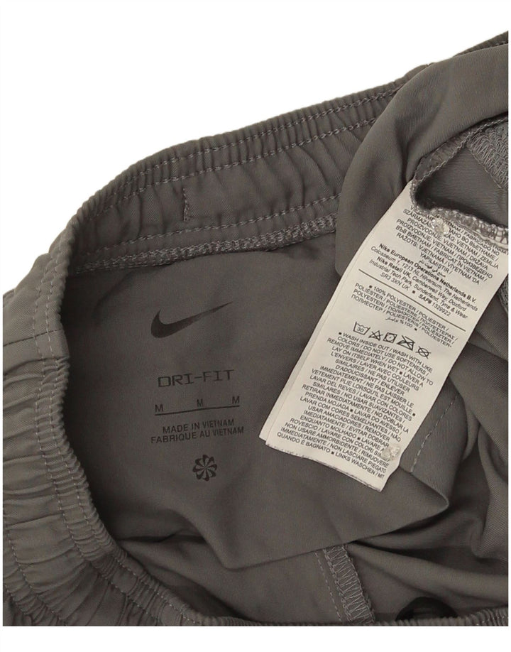 Męskie spodnie dresowe Nike Dri Fit, średnioszare, poliestrowe