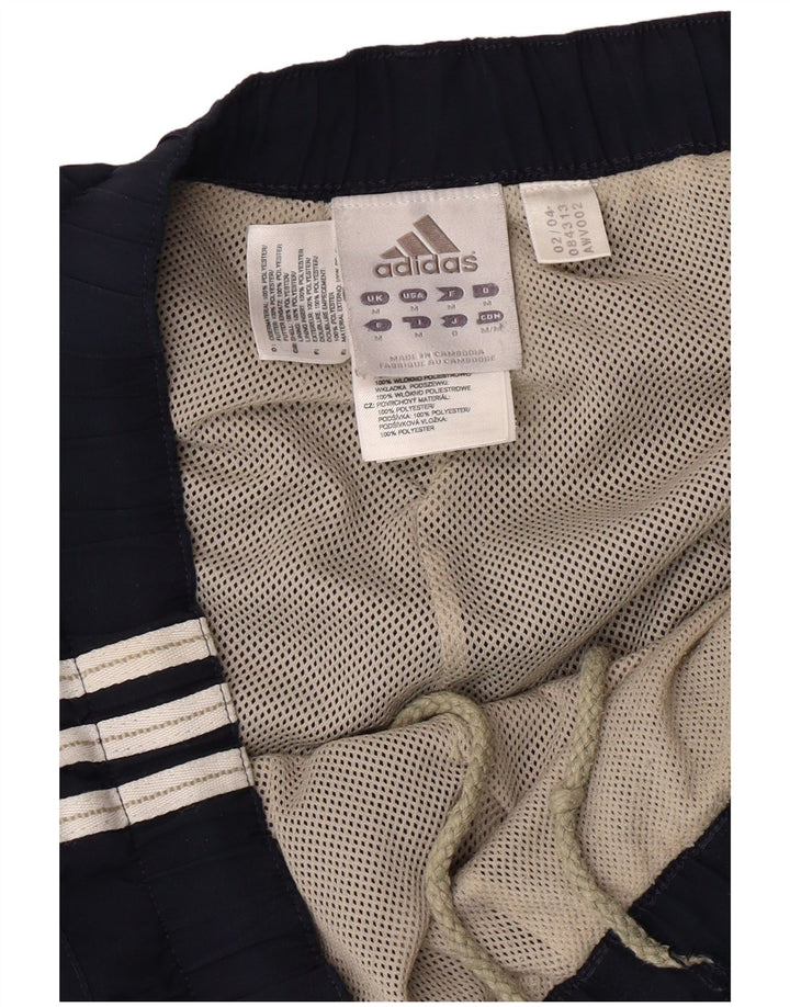 Męskie spodnie dresowe ADIDAS, średni granatowy poliester