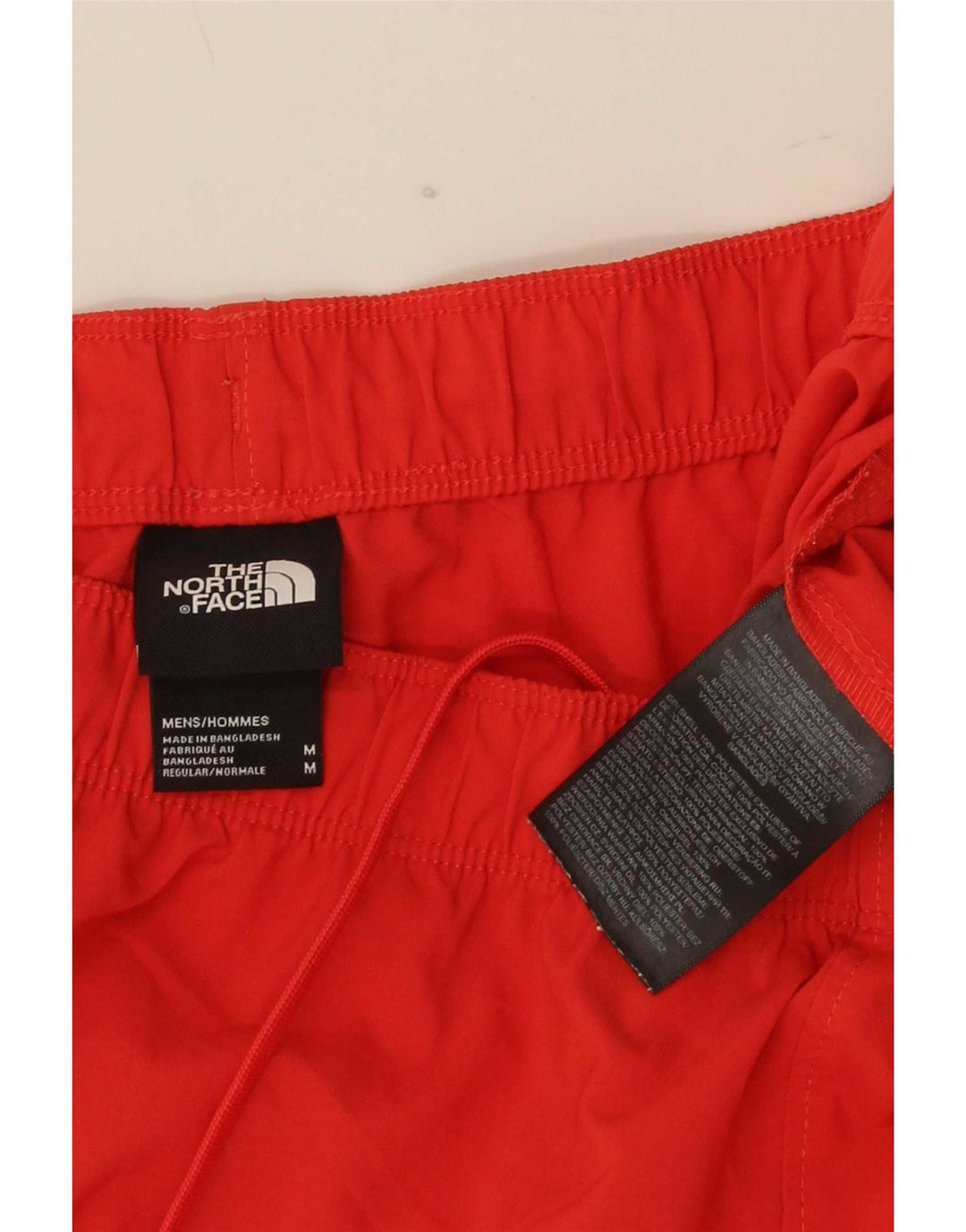 Męskie spodenki sportowe The North Face, poliestrowe, w kolorze średniej czerwieni