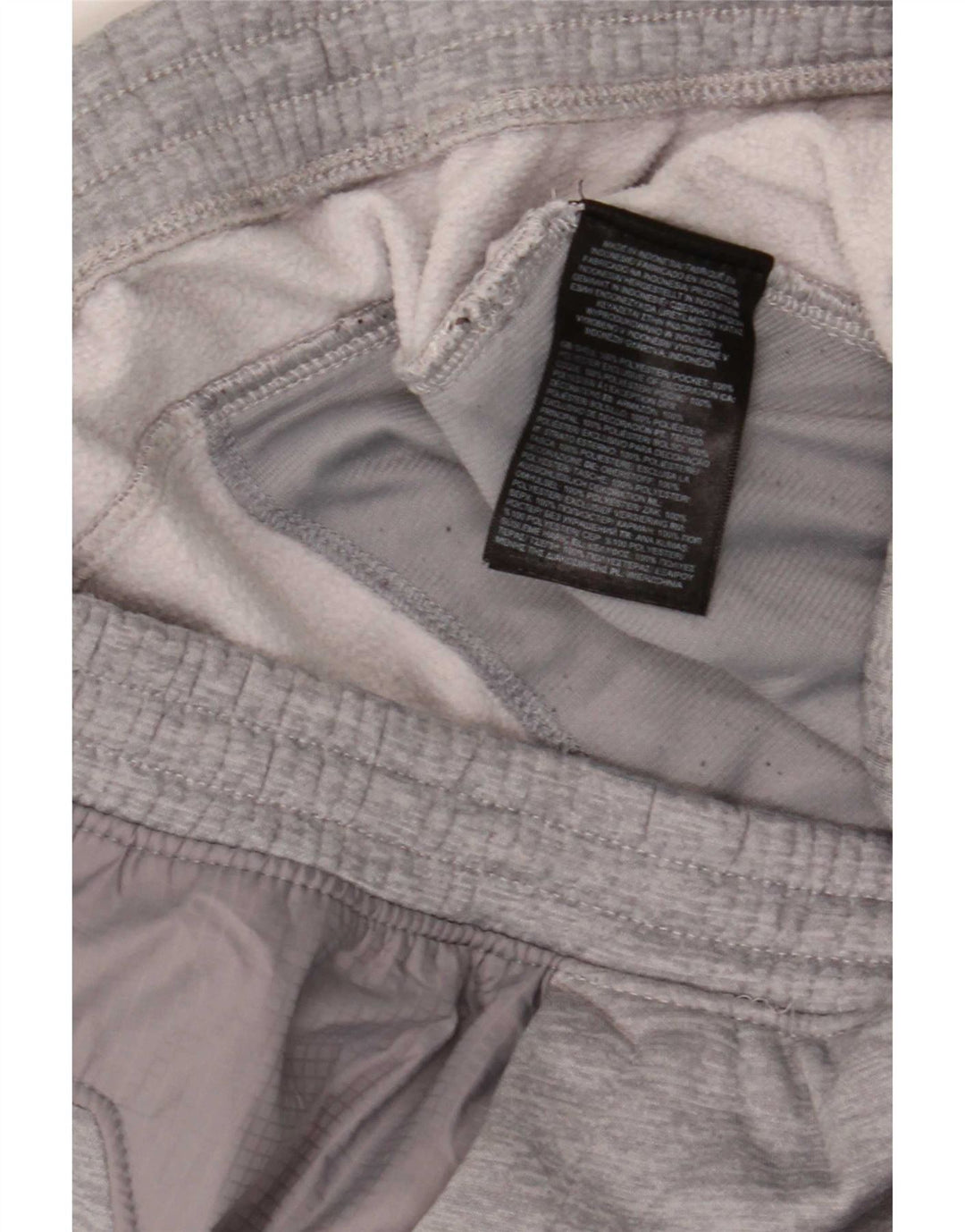 Męskie spodnie dresowe The North Face Joggery w kolorze średnioszarym, z poliestru