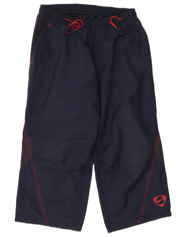 Męskie spodnie dresowe NIKE Capri, nylon w kolorze średniego granatu