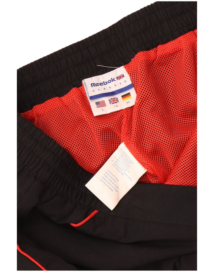 Damskie spodnie dresowe Reebok UK 14, duże, czarne, poliestrowe