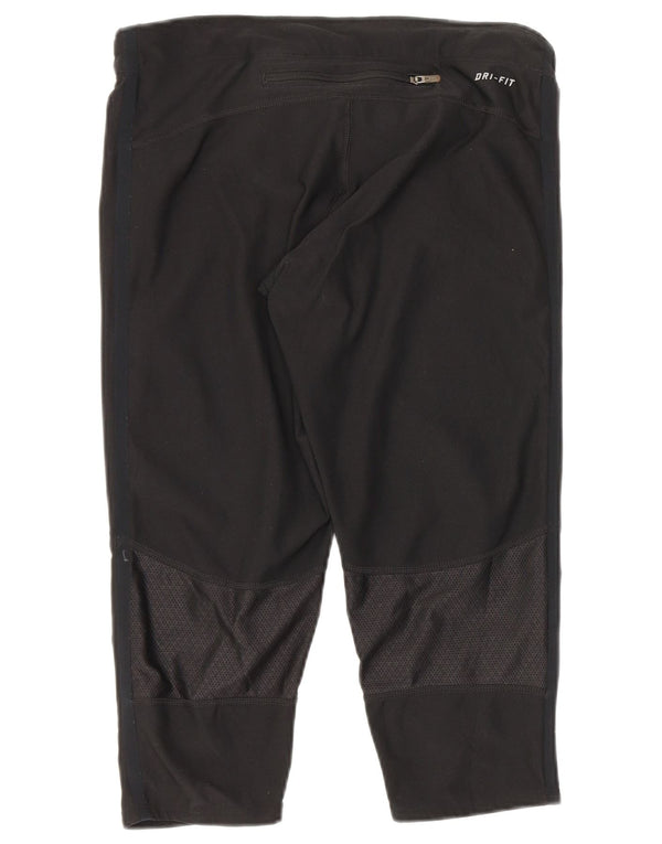 Damskie legginsy Nike Capri UK 8, małe, czarne, poliestrowe cętki