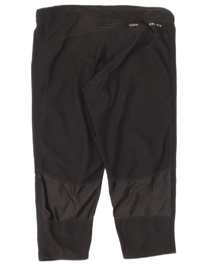 Damskie legginsy Nike Capri UK 8, małe, czarne, poliestrowe cętki