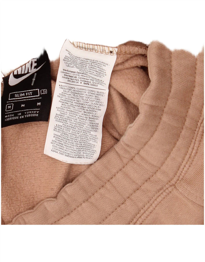 Damskie spodnie dresowe Nike Slim Fit UK 14, średnioróżowe, bawełniane