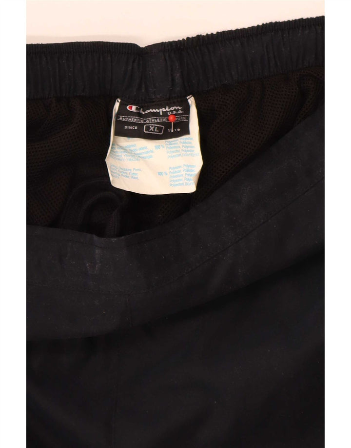 Damskie spodnie dresowe Champion UK 18 XL, granatowe, poliestrowe