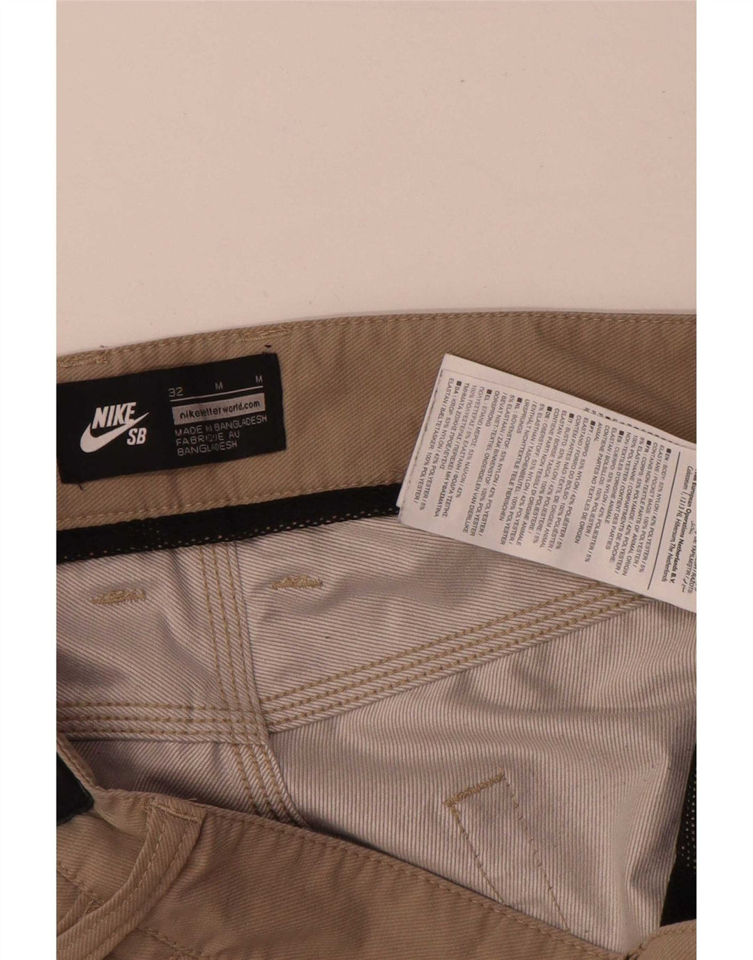 Męskie spodenki na co dzień Nike Regular W32 Średni beżowy nylon