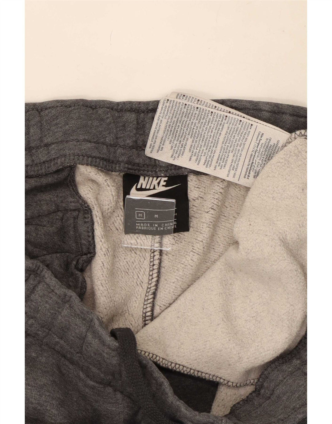 Męskie spodnie dresowe Nike z grafiką, średnioszare, bawełniane