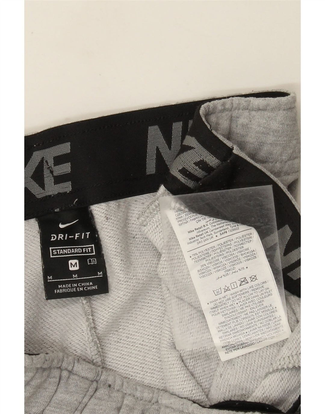 Męskie spodnie dresowe Nike Dri Fit, średnioszare, nakrapiane