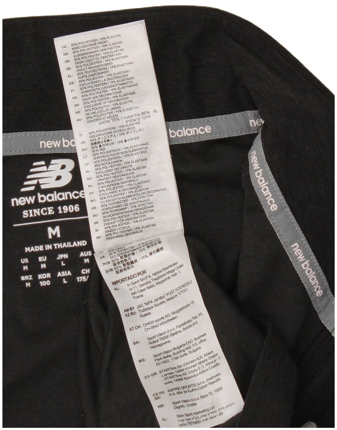 Męski dres New Balance z zamkiem błyskawicznym, średni czarny nakrapiany