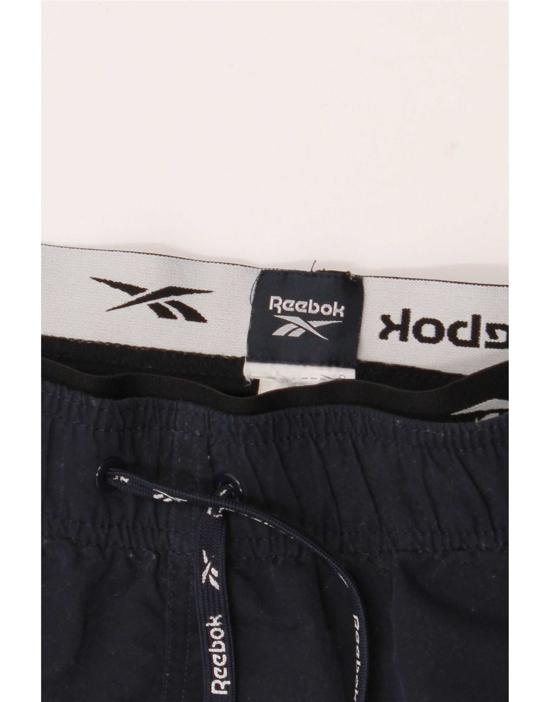 Męskie spodenki sportowe Reebok Graphic, średni kolor granatowy