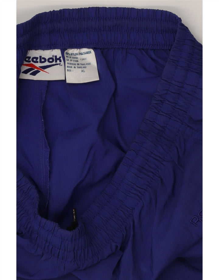 Męskie spodnie dresowe REEBOK Joggers XL Fioletowy poliester