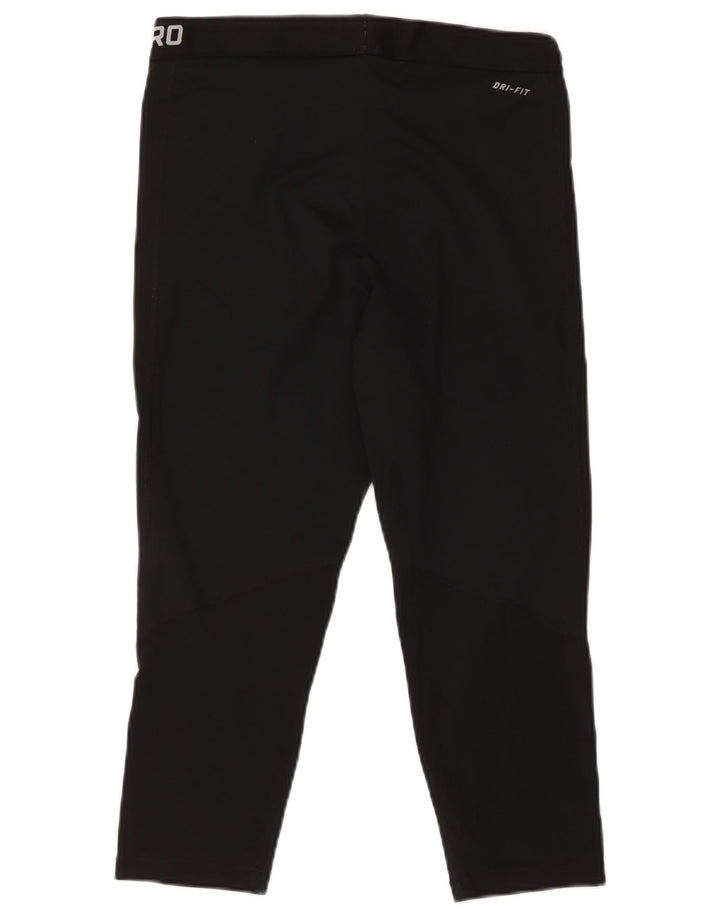 Damskie legginsy Nike Dri Fit Graphic Capri UK 18 XL, czarny poliester