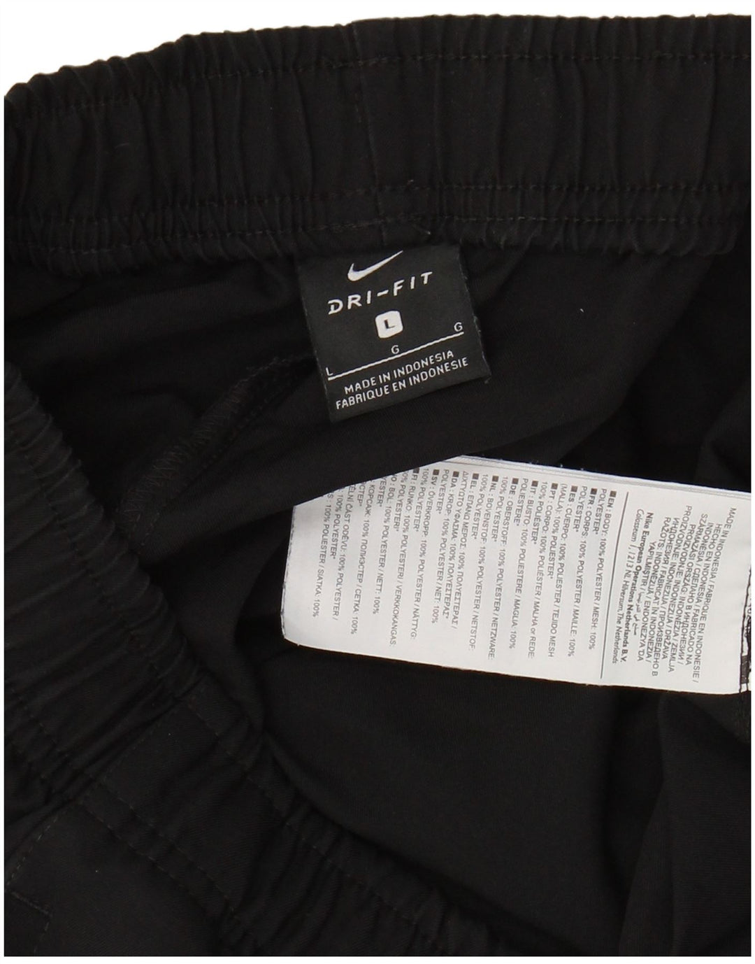 Męskie spodnie dresowe NIKE Dri Fit, duży, czarny poliester z blokami kolorów