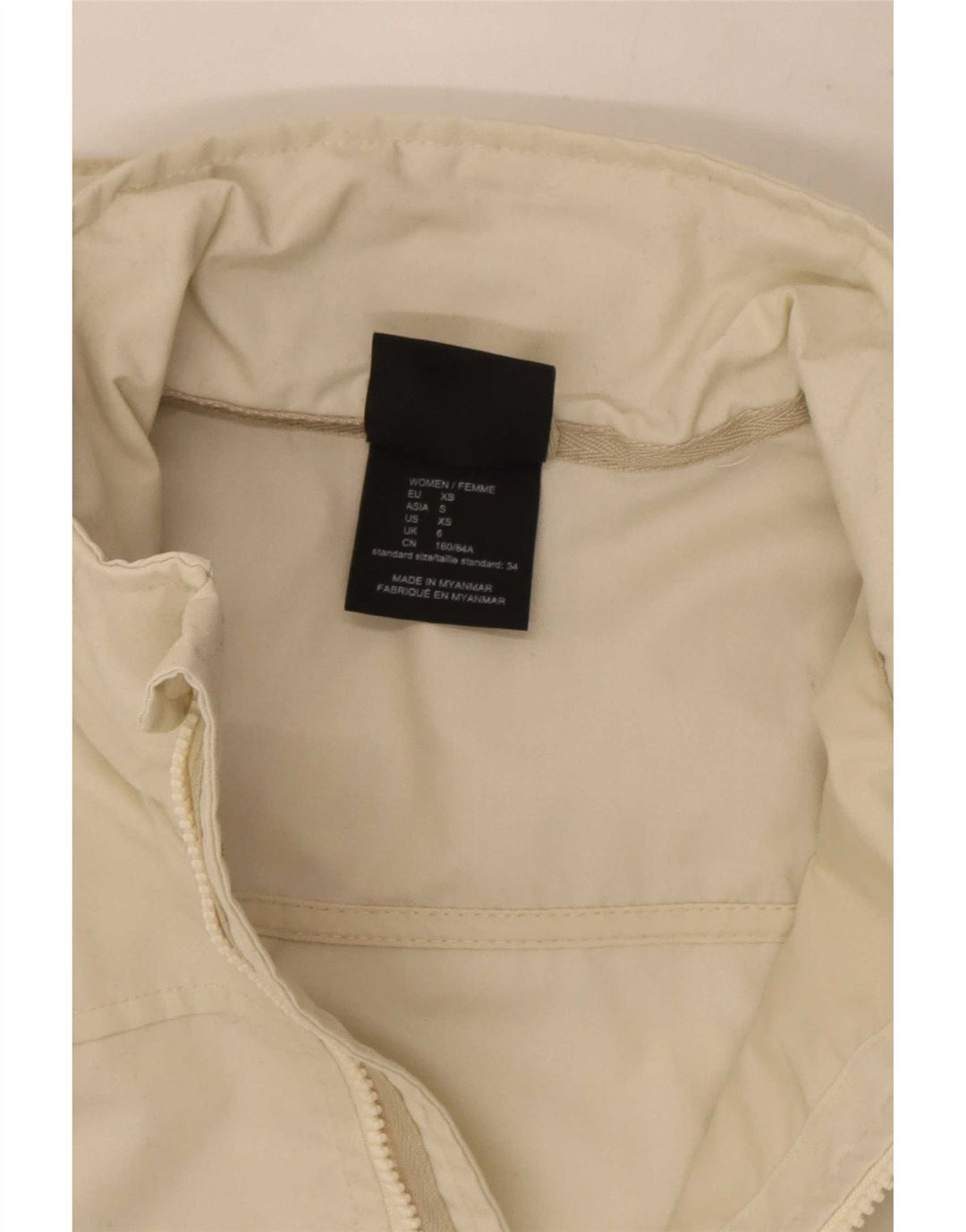 Damska kurtka przeciwdeszczowa z kapturem Jack Wolfskin UK 6 XS w kolorze złamanej bieli, poliester