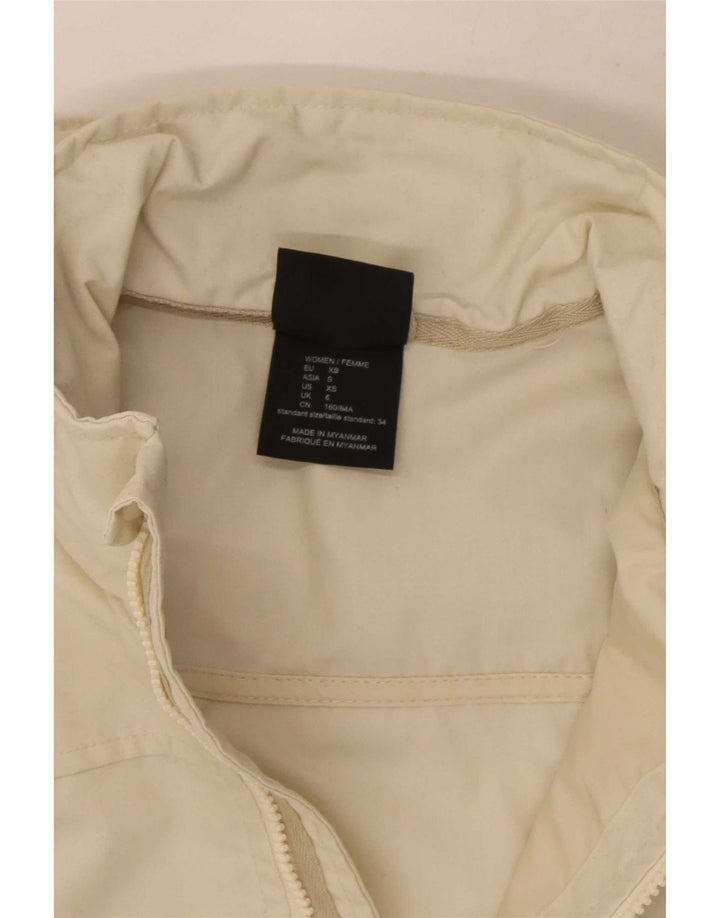Damska kurtka przeciwdeszczowa z kapturem Jack Wolfskin UK 6 XS w kolorze złamanej bieli, poliester