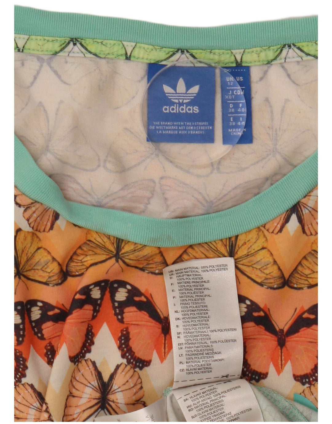 Damska koszulka z grafiką ADIDAS Top UK 12 Średni wielobarwny motyl