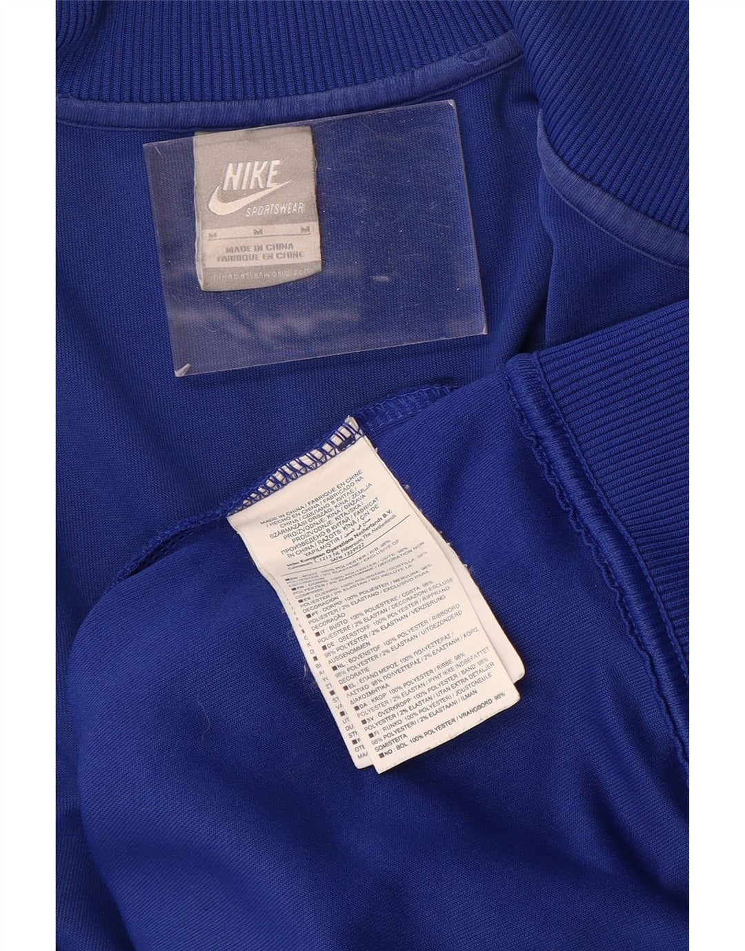 Męska kurtka dresowa NIKE z graficznym topem, poliestrowa w kolorze średnioniebieskim