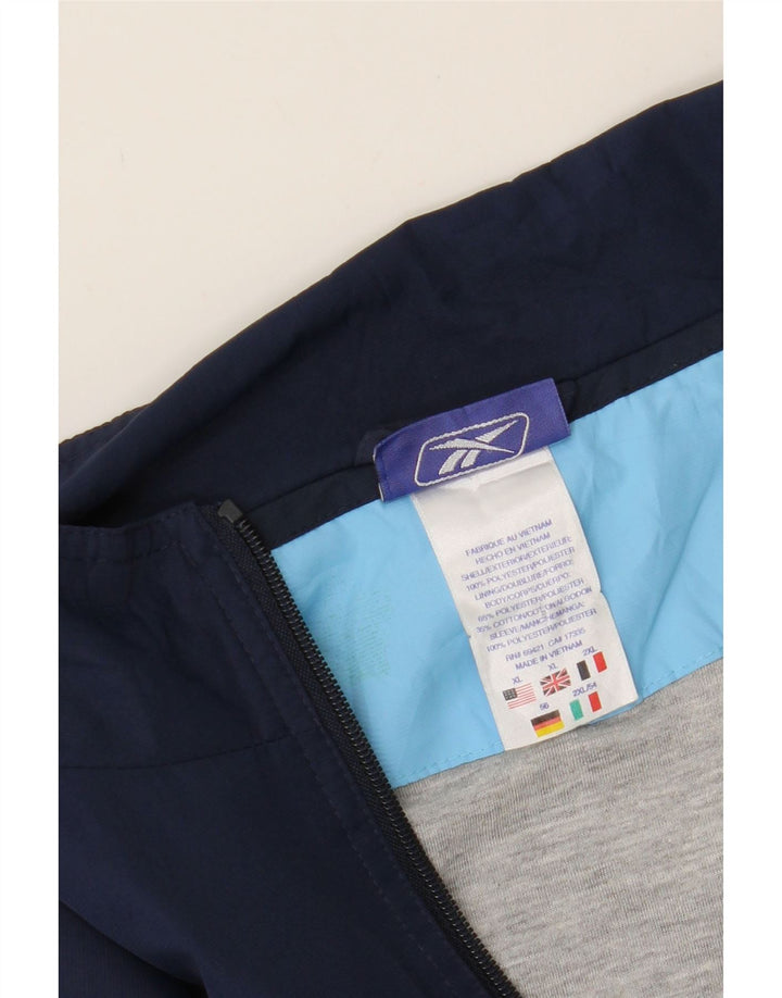 REEBOK Mens Tracksuit Top Jacket XL Navy Blue Colourblock Polyester Vintage Reebok and Second-Hand Reebok from Messina Hembry 