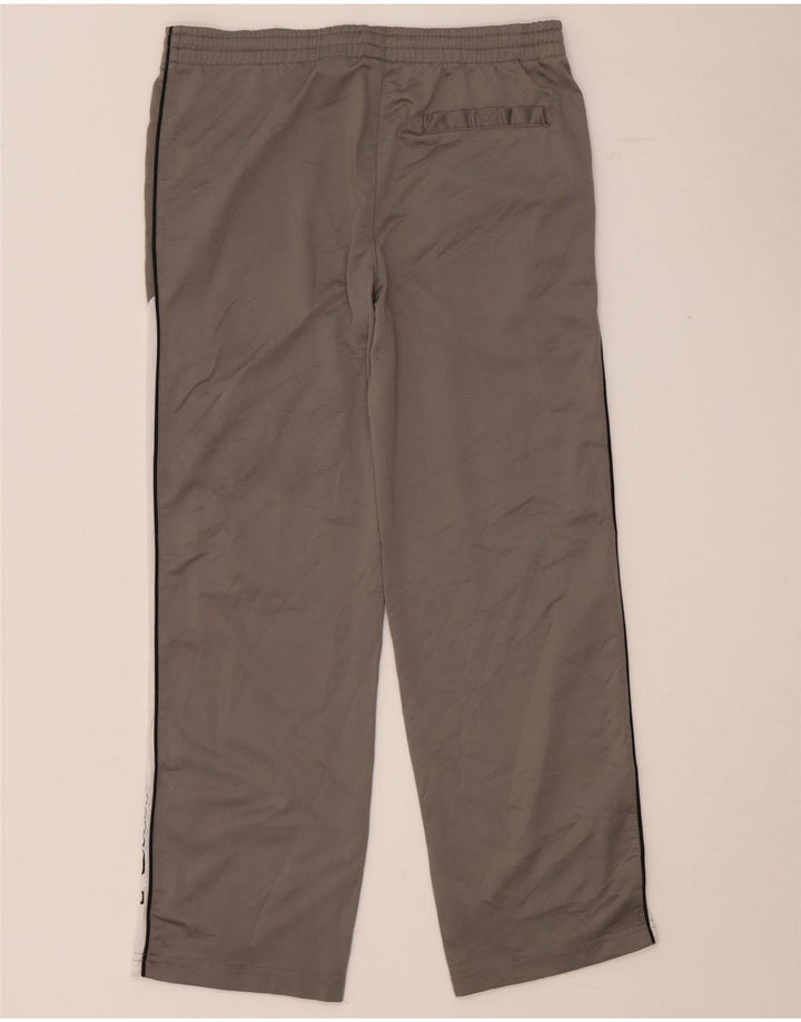 Chłopięce spodnie dresowe Puma z grafiką 9-10 lat, średnioszare, z blokami kolorów